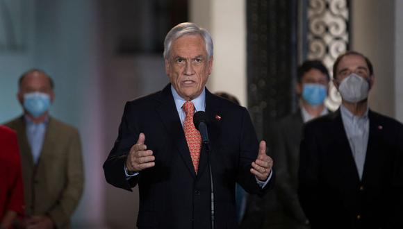 El presidente de Chile, Sebastián Piñera, habla en el palacio presidencial de La Moneda, en Santiago. (AFP/CLAUDIO REYES).