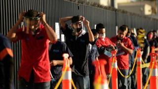 Trabajadores regresan a fábricas fronterizas mexicanas ante reactivación de sector automotor