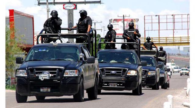 Torreón, México. Homicidios: 330. Población: 1.186.637. Tasa de homicidios: 27.81. En la imagen, oficiales de policía patrullan una calle de Torreón. (Foto: AP)
