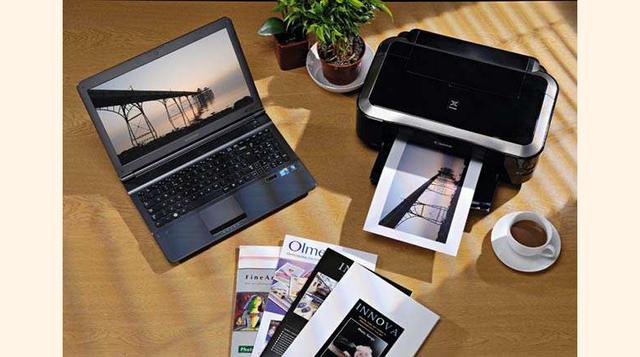 Impresoras de fotos.  Con una Canon SELPHY Color Photo Printer su mamá podrá imprimir cómodamente en su casa fotografías de la familia y los hijos.