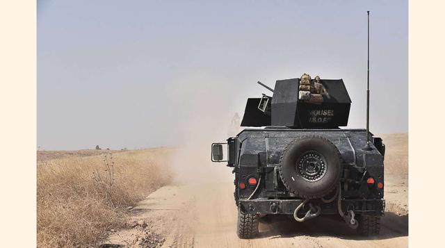 Un convoy de soldados de las fuerzas especiales iraquíes se dirigen al frente de Qaraqosh en la batalla por liberar Mosul. (foto:msn).