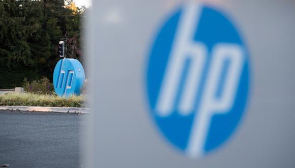 The HP logo is seen on a sign at Hewlett Packard's headquarters in Palo Alto, California on November 4, 2016. (Photo by JOSH EDELSON / AFP)