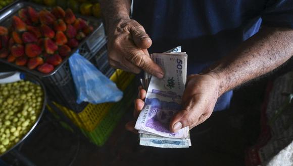 El peso ha avanzado un 24% este año, el mayor repunte entre las más de 140 monedas seguidas por Bloomberg. (Foto de Joaquin Sarmiento / AFP)