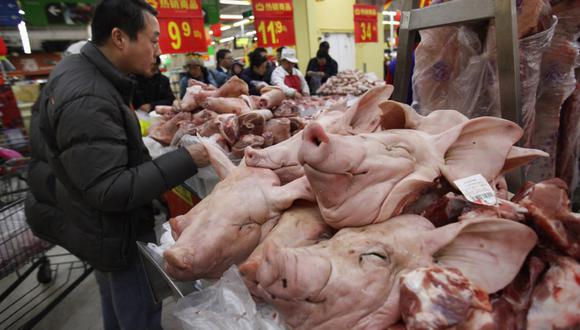 FOTO 8 | En Walmart venden cabezas de cerdo y cocodrilos.