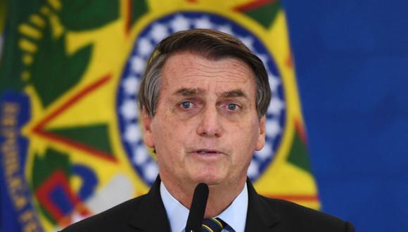 “Este es un momento que marca nuestra historia, nuestra economía”, dijo Bolsonaro tras el fin de la operación en la Bolsa de Sao Paulo.  (Foto: EVARISTO SA / AFP).