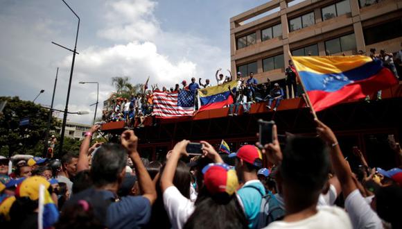 Los partidarios de la oposición asisten a un mitin contra el gobierno del presidente de Venezuela, Nicolás Maduro, y para conmemorar el Primero de Mayo en Caracas. (Foto: Reuters)