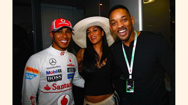 Es común ver a estrellas de cine y otras celebridades durante el fin de semana del Gran Premio. En la foto aparecen el piloto Lewis Hamilton junto a la cantante pop Nicole Scherzinger y al actor Will Smith. (Foto: f1aldia.com)