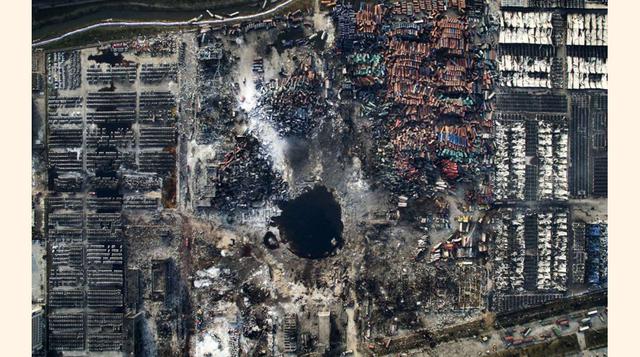7. Daños tras explosión en estación de contenedores en el puerto de Tiankin, Noreste de China – Chen Jie. (foto:msn).