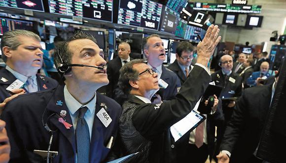 Mercados. El declive de principales bolsas afectó inversiones de AFP. (Foto: AP Photo/Richard Drew)