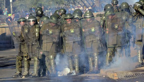 Carabineros de Chile. (Photo by Martin BERNETTI / AFP).