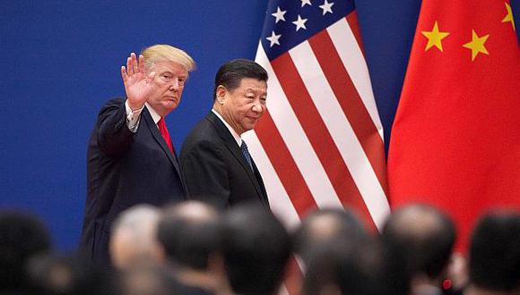 Donal Trump junto a su par chino, Xi Jinping, (Foto: AFP)