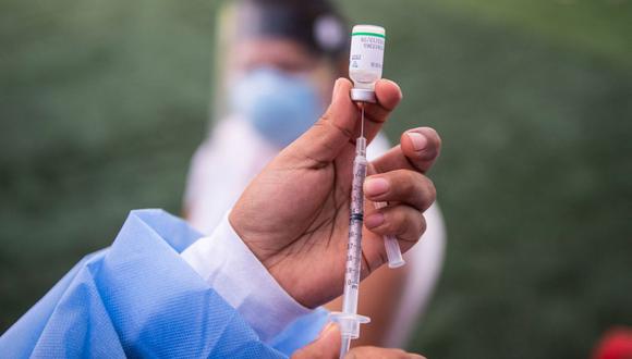 Un grupo de los 12,000 voluntarios del ensayo clínico de Sinopharm reclaman acceder a dosis contra el COVID-19. | Foto referencial:  AFP