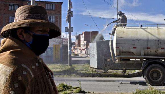 Bolivia reporta catorce fallecidos y 194 casos de la enfermedad, con estado de emergencia sanitaria declarado hasta el próximo 15 de abril. (AFP/AIZAR RALDES).