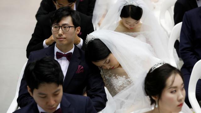 FOTO 2 | La masiva ceremonia de bodas fue organizada por la Iglesia de Unificación.