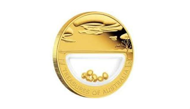 Australia. (Australia) La particularidad de esta moneda es que dentro suyo guarda fragmentos de minerales extraídos del propio suelo australiano.
