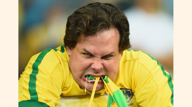 Hincha brasileño durante el partido que Brasil perdió 7 a 1 frente a Alemania en la semifinal del Mundial Brasil 2014. (Foto: Getty Images)