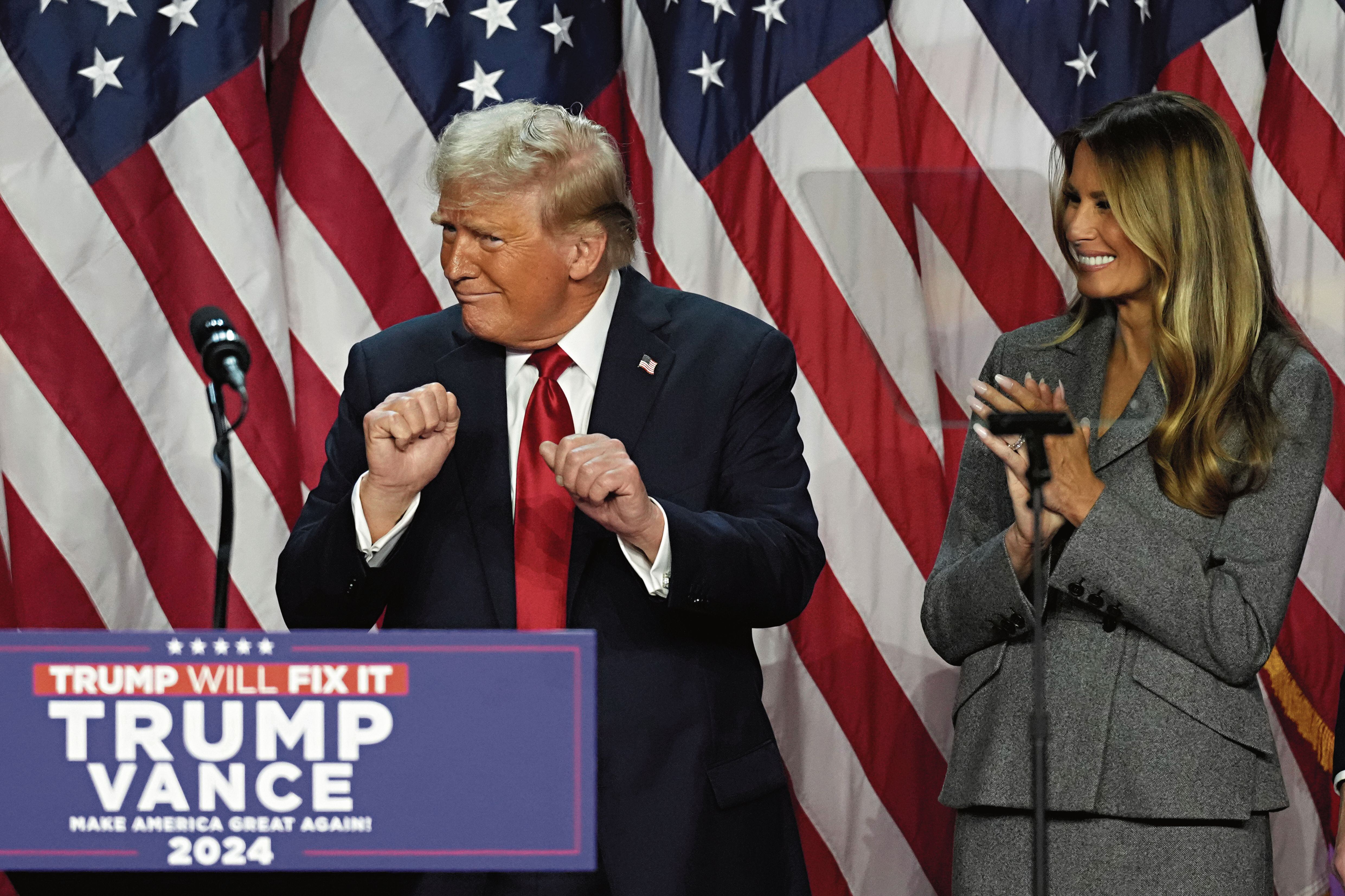 Republican Presidential nominee former President Donald Trump dances as former first lady Melania Trump watches at the Palm Beach County Convention Center during an election night watch party, Wednesday, Nov. 6, 2024, in West Palm Beach, Fla. (AP Photo/Lynne Sladky)