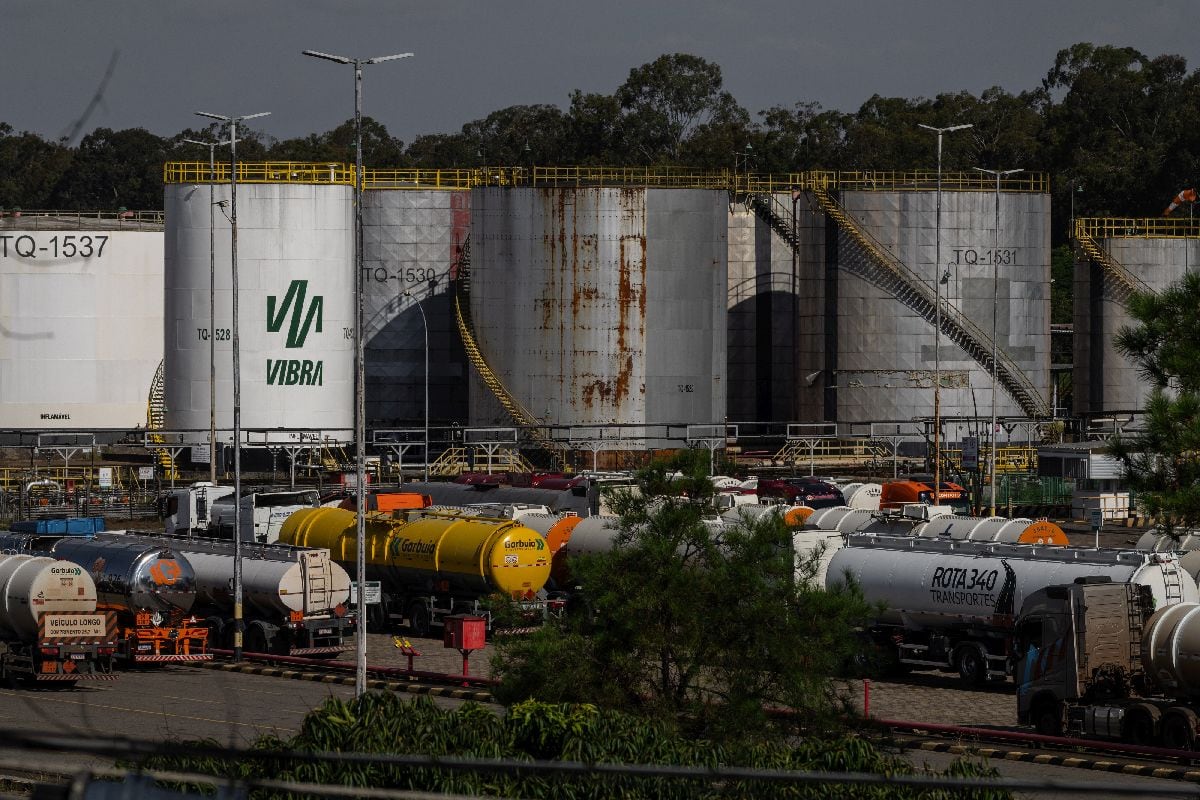 Trucks near oil storage tanks at the Petroleo Brasileiro SA (Petrobras) Paulinia Replan Refinery in Paulinia, Sao Paulo state, Brazil, on Wednesday, March 4, 2026. Petrobras' fourth quarter results are expected to get a boost from production levels, which remained in line with the records seen in the third quarter, analysts say.