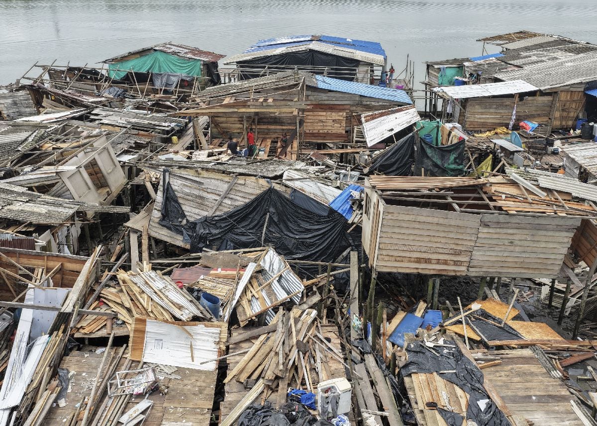 Destroyed homes along the water following an earthquake in the Carlos Lleras-La Ruñidera neighborhood of Buenaventura, Colombia, on Aug. 12.