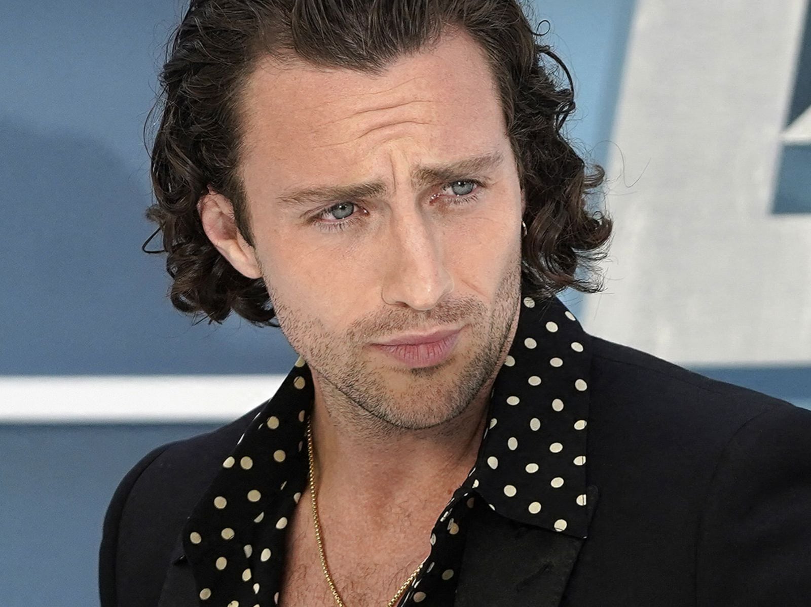 El actor inglés Aaron Taylor-Johnson posa cuando llega para asistir a la proyección de gala en el Reino Unido de la película "Bullet Train" en Londres el 20 de julio de 2022 (Foto: Niklas Halle'n / AFP)