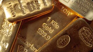Precios del oro caen desde máximos de tres meses por el fortalecimiento del dólar