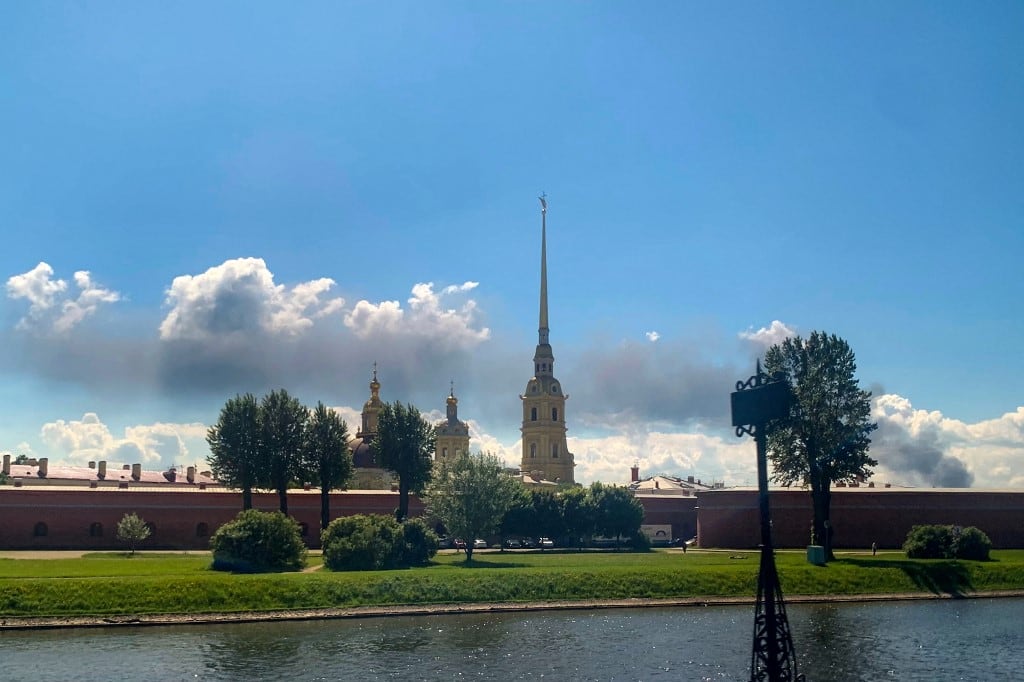 Black smoke rises in distance behind the Peter and Paul Fortress in Saint Petersburg in on June 3, 2026. Ukrainian drones hit energy and military sites in Saint Petersburg early Wednesday morning as officials gathered for a flagship economic forum in the city, Russian and Ukrainian authorities said. Saint Petersburg Governor Alexander Beglov, said "several" infrastructure facilities were damaged, but no one was killed in the attack. (Photo by AFP)