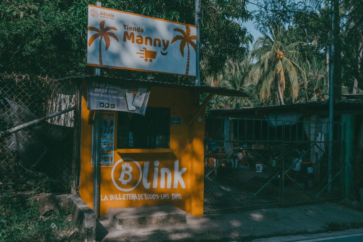 A vendor stands accepts Bitcoin in El Zonte. Photographer: Carlos Barrera/Bloomberg