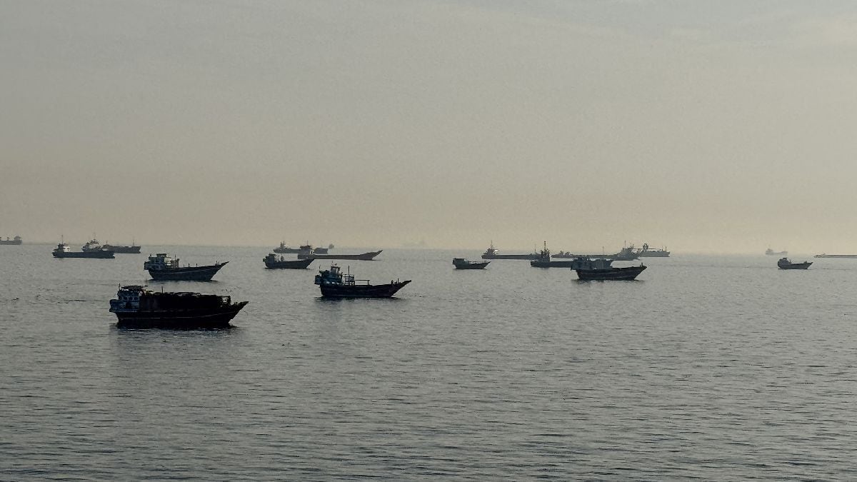 Vessels are seen anchored in the Strait of Hormuz, off the port city of Khasab on Oman's northern Musandam Peninsula in May 2026. Photographer: -/AFP/Getty Images