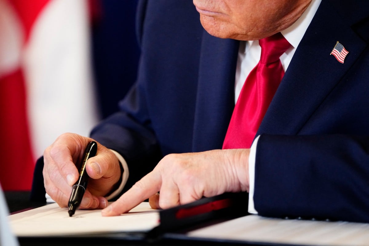 El presidente estadounidense, Donald Trump, firmó el martes en la sede de la ONU un acuerdo de seguridad con Groenlandia y Dinamarca, que definió como el inicio de una relación "fantástica" y beneficiosa para la OTAN. (Foto: Mads Claus Rasmussen / Ritzau Scanpix / AFP) / Denmark OUT