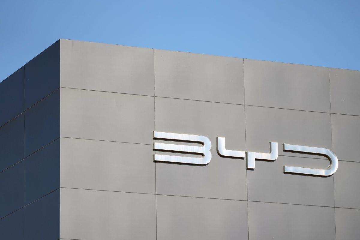 Signage at a BYD Co. dealership in Beijing, China, on Tuesday, Aug. 27, 2024. China's top-selling automaker BYD expects overseas deliveries to account for almost half of total sales in the future, suggesting it will continue to set up global production hubs to overcome punishing tariffs.