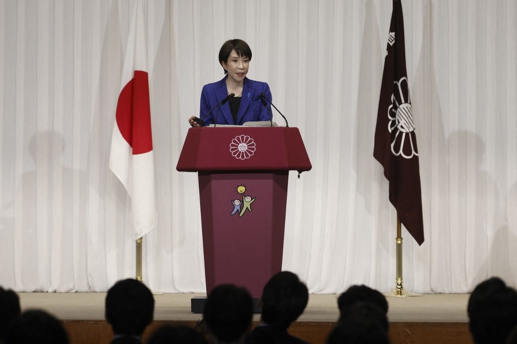 Japan's Prime Minister Sanae Takaichi, leader of the ruling Liberal Democratic Party (LDP), speaks during a press conference at the LDP headquarters in Tokyo on February 9, 2026. Japanese Prime Minister Sanae Takaichi said on February 9 she felt a "heavy responsibility" to make the country stronger and more prosperous after winning a landslide election victory. (Photo by Franck ROBICHON / POOL / AFP)