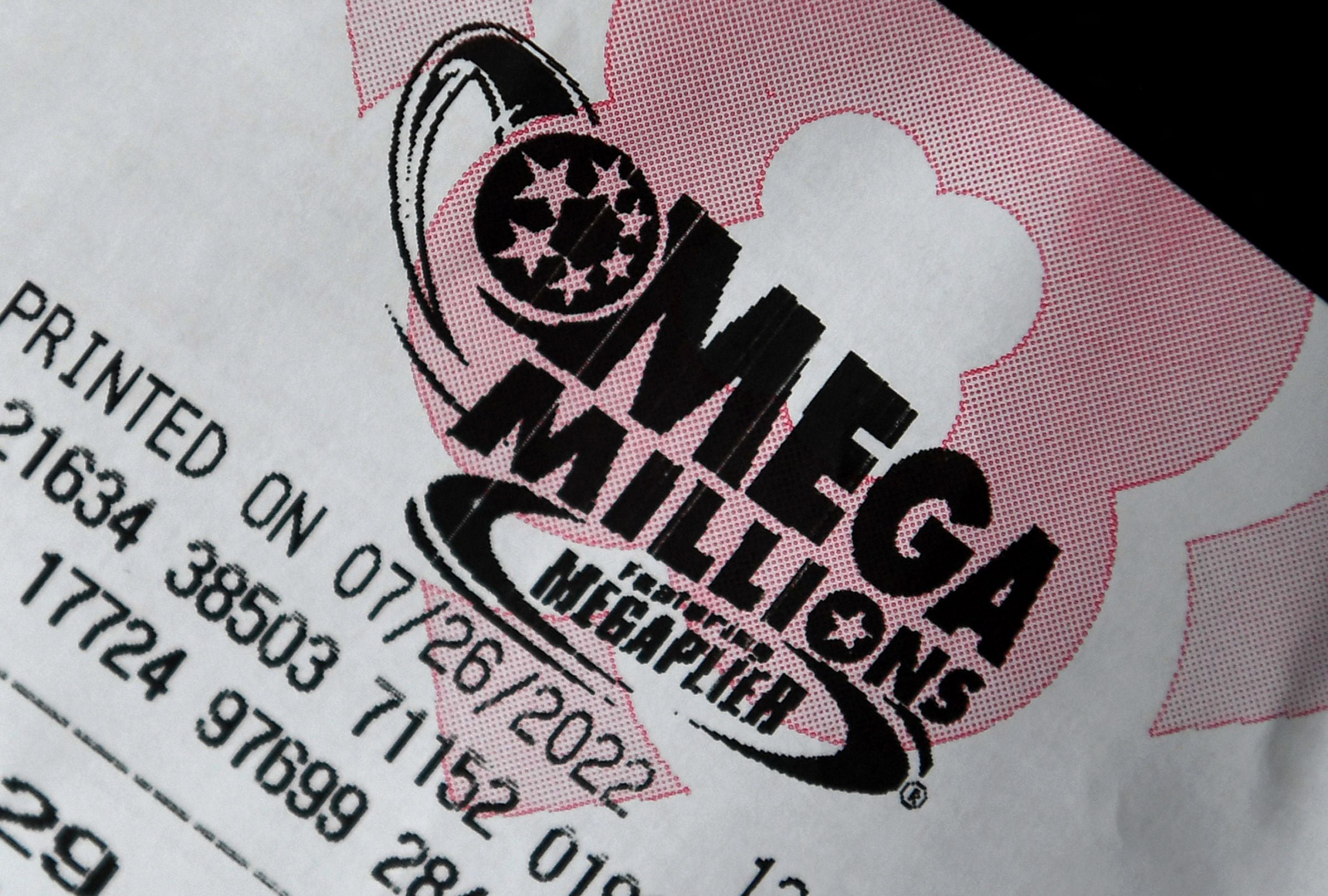 Revisa esta nota para que sepas a cuánto asciende el jackpot de la lotería Mega Millions para el sorteo del martes 21 de julio de 2026. (Foto: OLIVIER DOULIERY / AFP)