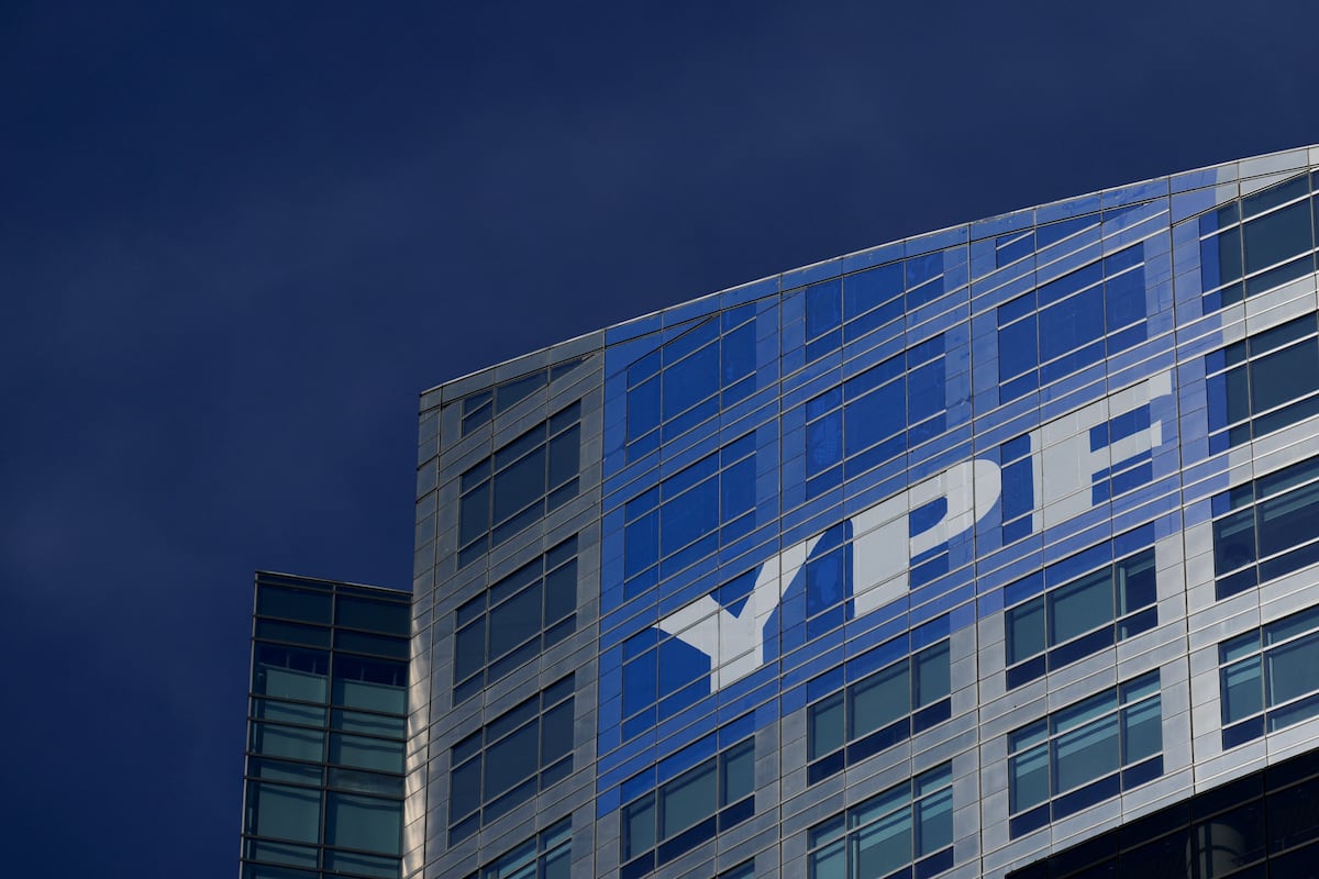 (FILES) The logo of the Argentine national oil company YPF is seen on the company's headquarters in Buenos Aires on July 28, 2023. Argentina could be forced to pay 16,000 million dollars in compensation for the nationalization of the YPF oil company in 2012, after the ruling of a US judge who accepted the arguments of the plaintiffs on the payment of compensatory interest for this operation, on September 8, 2023. (Photo by LUIS ROBAYO / AFP)
