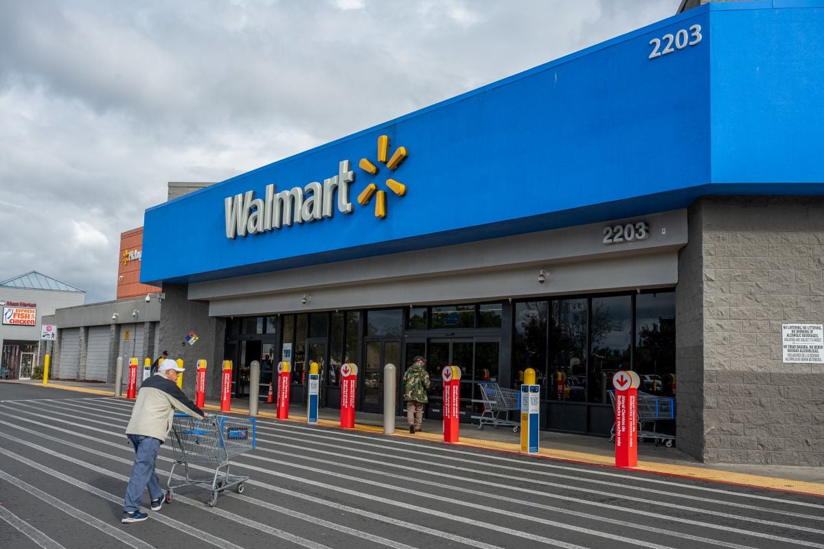 A shopper outside a Walmart store in Pittsburg, California. Photographer: David Paul Morris/Bloomberg