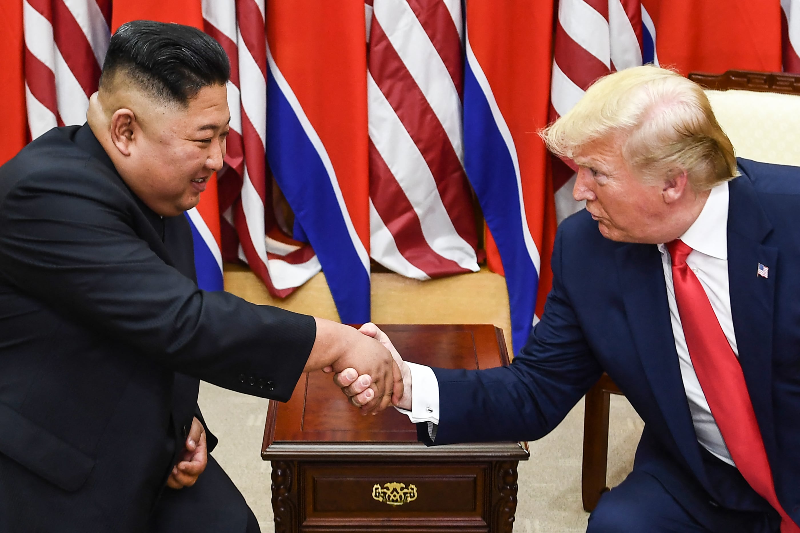 Kim Jong-un y Donald Trump. (Foto de Brendan Smialowski / AFP)