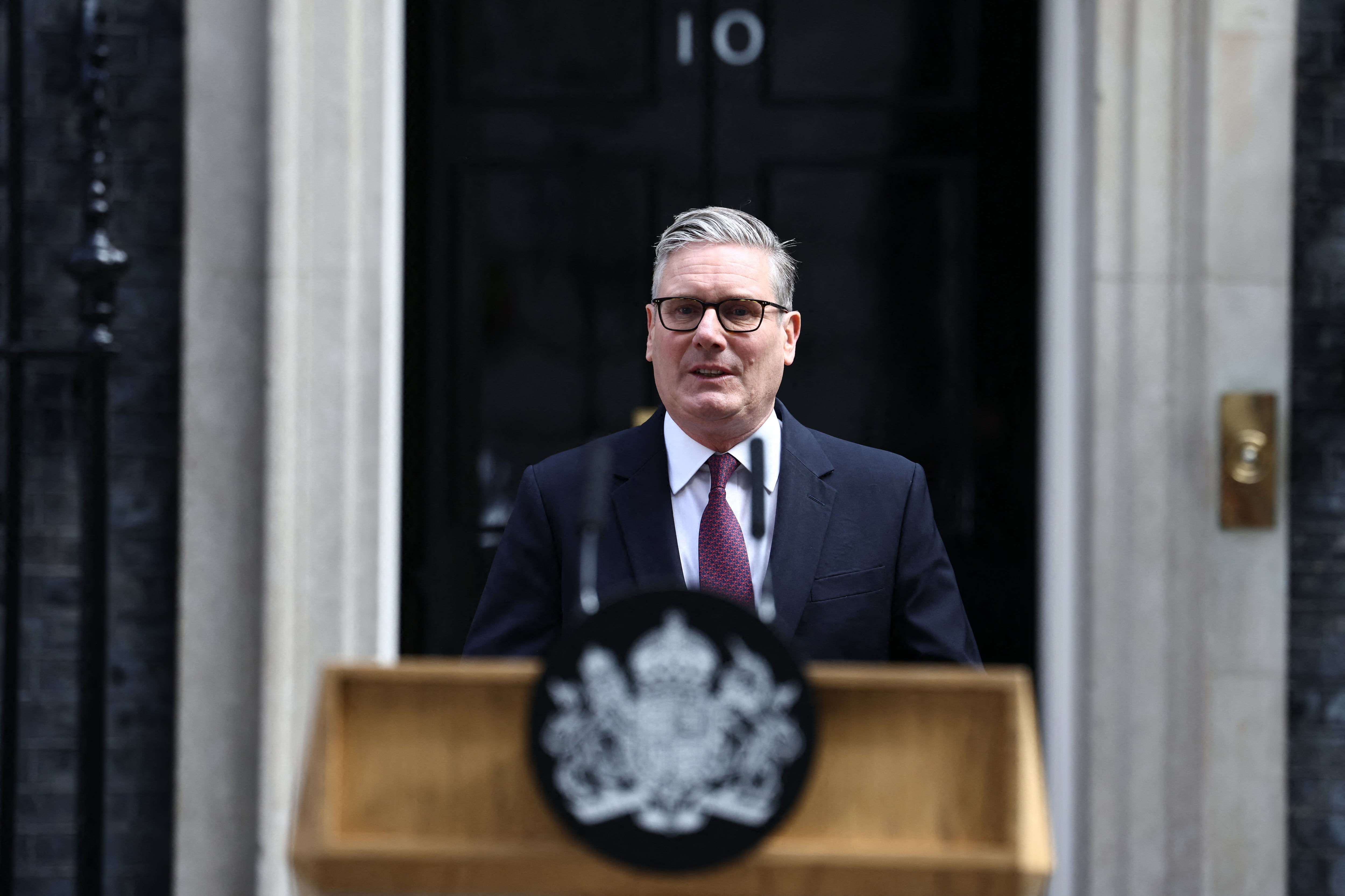 Britain's Prime Minister Keir Starmer makes a statement on his future outside 10 Downing Street on the morning of June 22, 2026, in London. Embattled British Prime Minister Keir Starmer will set out plans to step down, Monday, UK media has reported, the same day his likely successor is expected to be sworn in as a member of parliament. (Photo by Henry NICHOLLS / AFP)