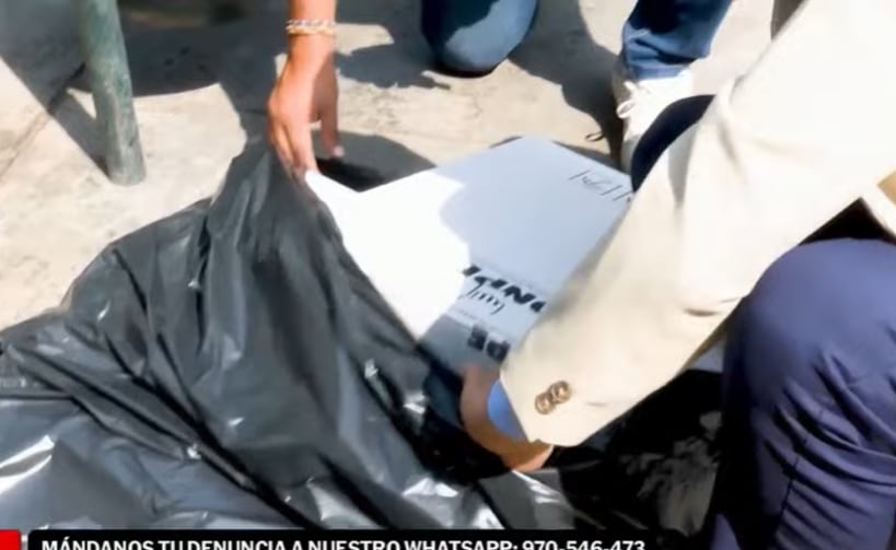 Cajas ONPE encontradas en la basura.