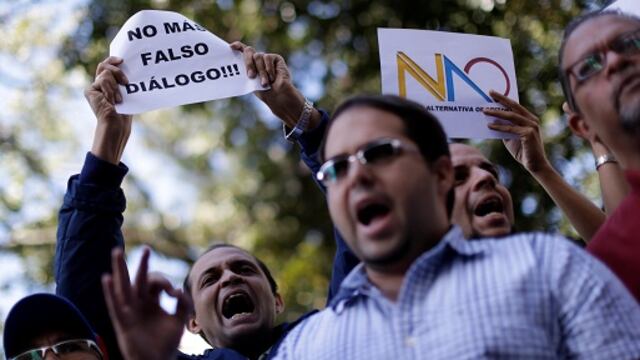 Oposición venezolana congela diálogo para exigir salida electoral