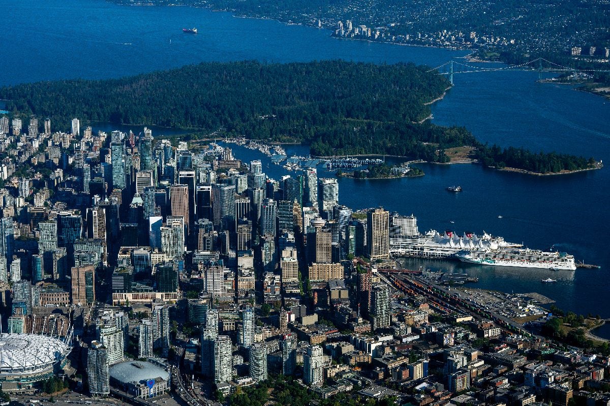 Buildings beside Stanley Park in Vancouver. Photographer: James MacDonald/Bloomberg