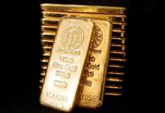 Precio del oro cae mientras dólar se estabiliza y atención se centra en alzas de la Fed