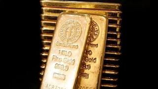 Precio del oro cae mientras dólar se estabiliza y atención se centra en alzas de la Fed