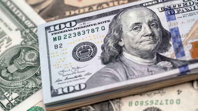 Hong Kong Dollar, Chinese Yuan and US Dollar Banknotes As Currency Peg Intervention From HKMA Continues Into Third Day