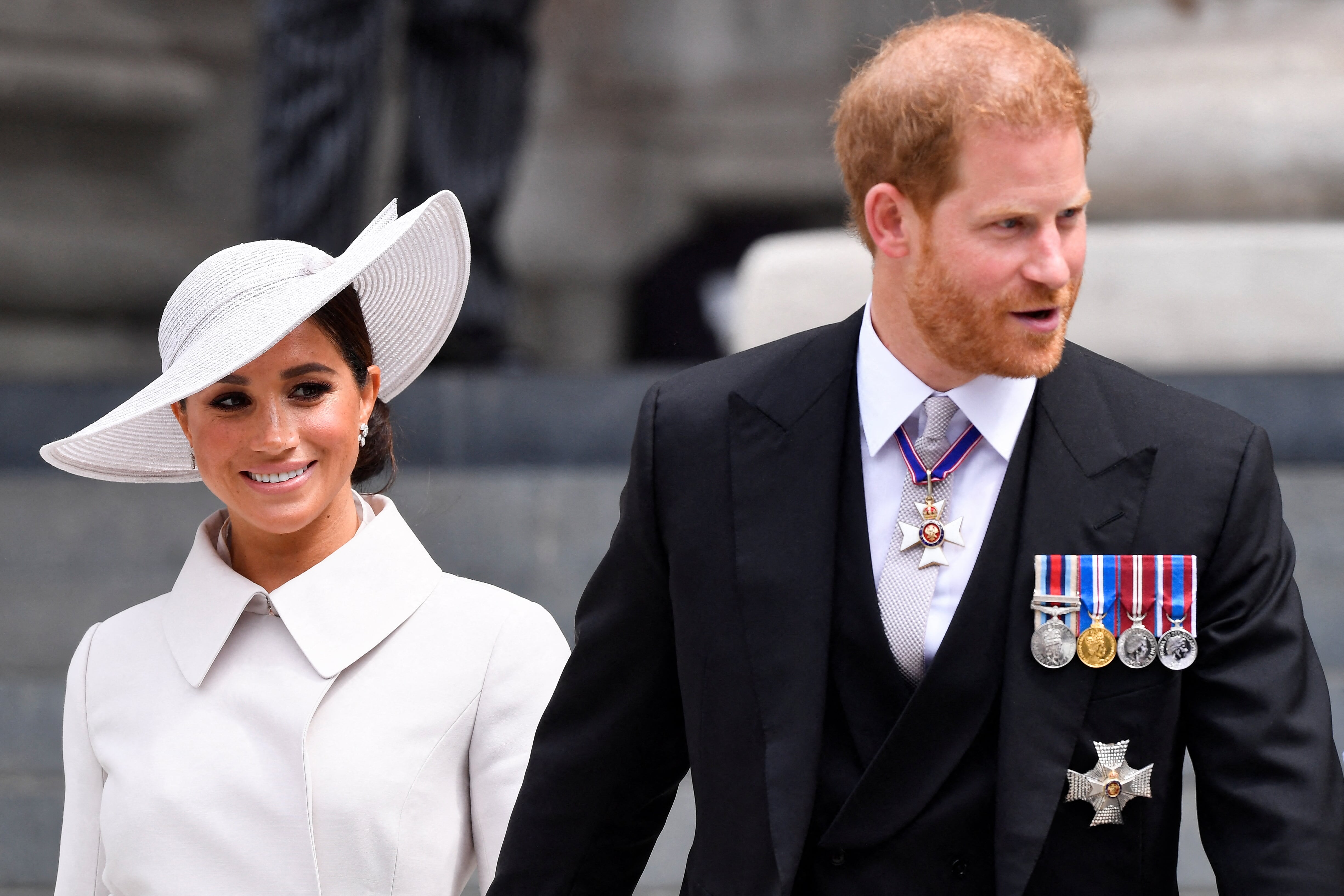 Meghan, la duquesa de Sussex y Harry de Gran Bretaña, el duque de Sussex. (Foto: Daniel LEAL / PISCINA / AFP)