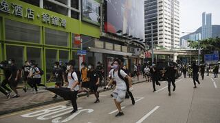 Casi 50 opositores, inculpados de “subversión” en Hong Kong