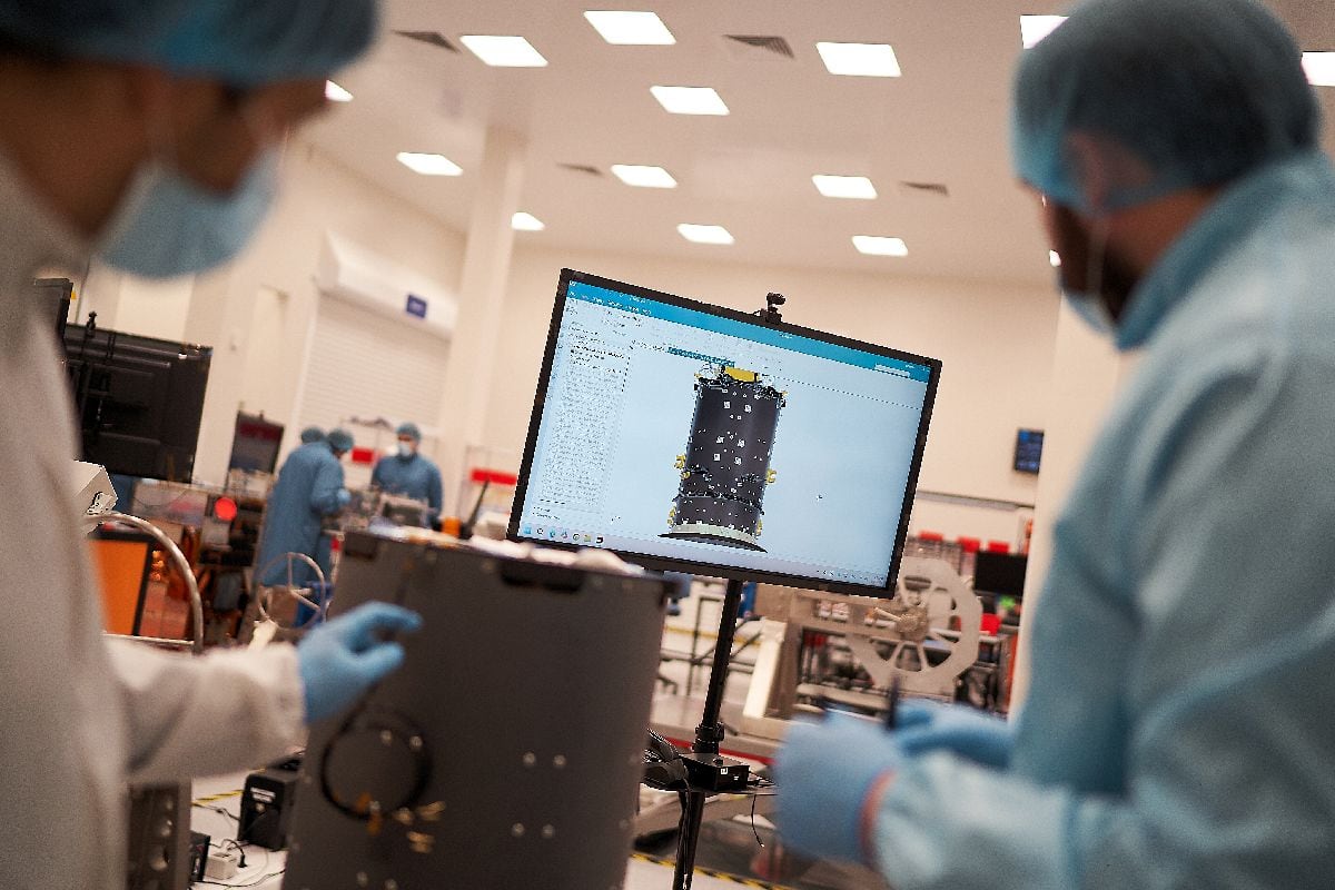 Workers assemble satellites at the Satellogic manufacturing facility in Montevideo. Photographer: Ana Ferreira/Bloomberg