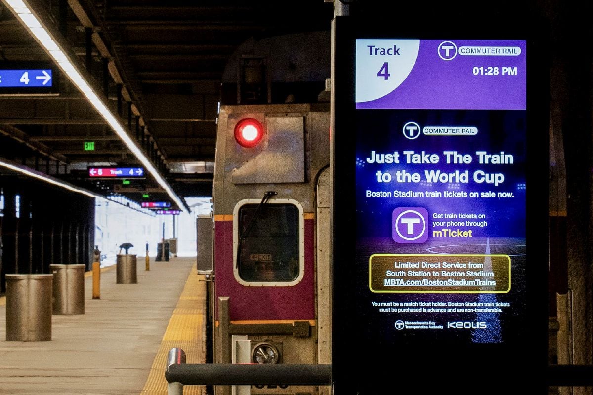 A sign promoting train tickets to Gillette Stadium for the World Cup at the South Station commuter rail station in Boston.