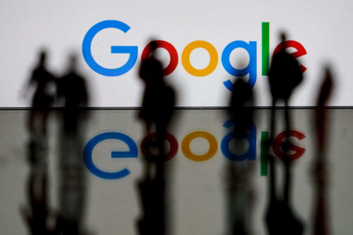 (FILES) This illustration picture shows the US multinational technology and Internet-related services company Google logo behind a European flag on February 14, 2020 in Brussels. Google begins a marathon battle in a federal court on September 12, 2023 to fight accusations from the US government that it acted unlawfully to become the world's preeminent search engine. (Photo by Kenzo TRIBOUILLARD / AFP)