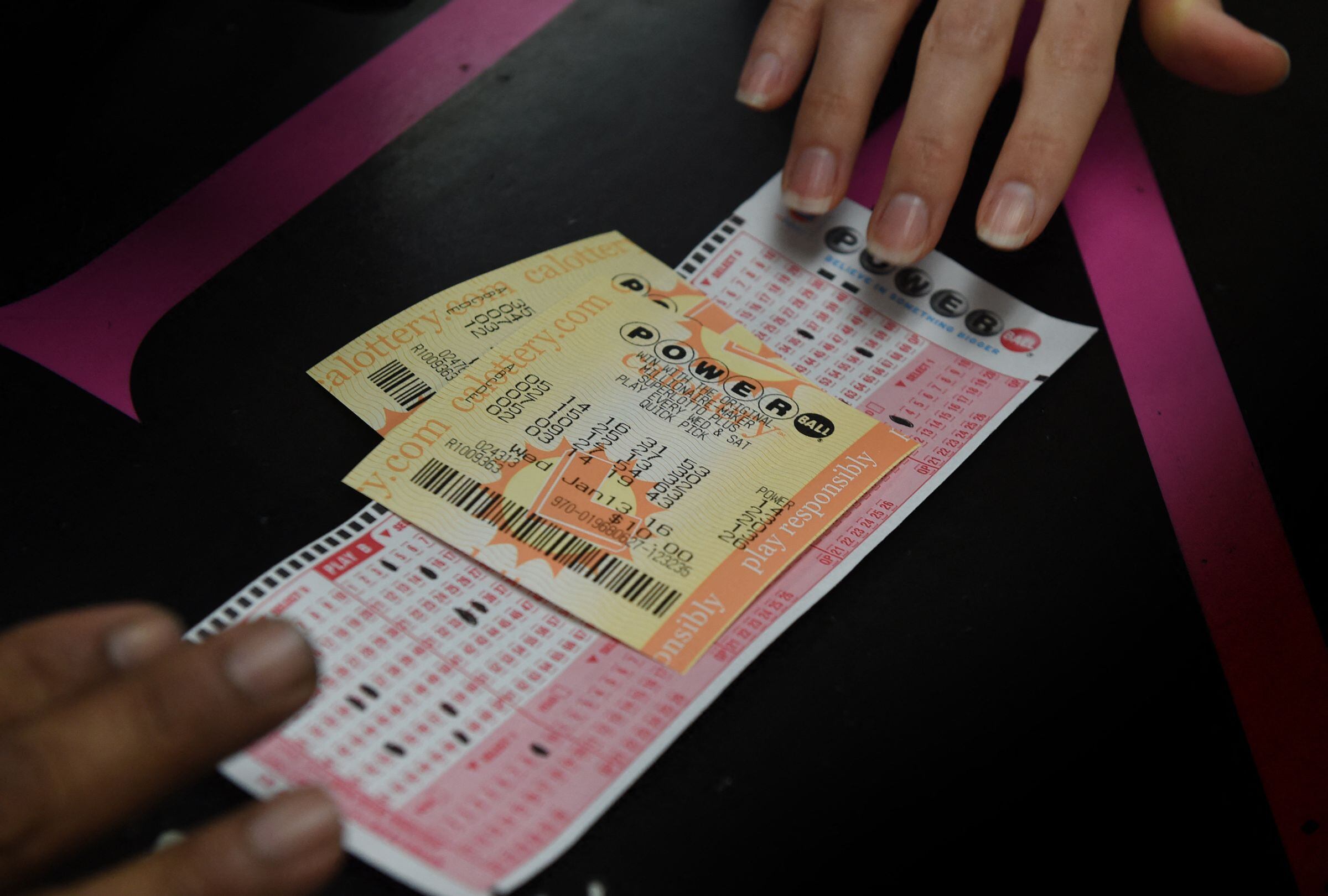 Descubre aquí el local en Texas donde se vendió el boleto de Powerball ganador de un millón de dólares. (Foto: Mark Ralston / AFP)