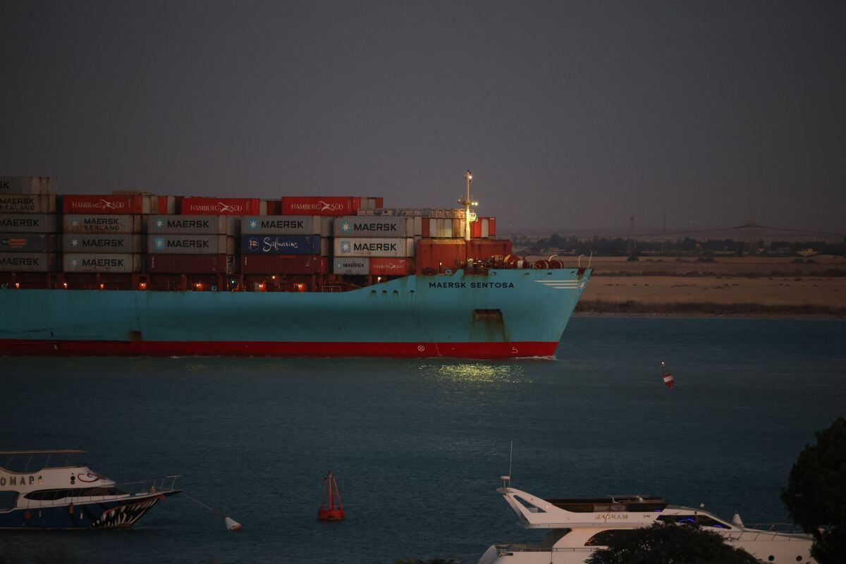 The Maersk Sentosa container ship sails southbound to exit the Suez Canal in Suez, Egypt, on Thursday, Dec. 21, 2023. A steep decline in the number of tankers entering a vital Red Sea conduit suggests that attacks on ships in the area are further disrupting a key artery of global trade.