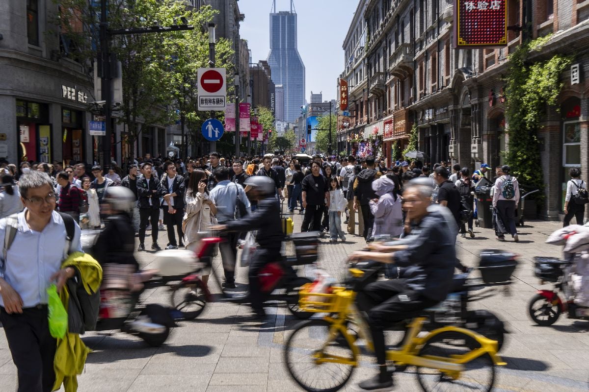 Visitors in the Nanjing East Road shopping area in Shanghai, China. Photographer: Qilai Shen/Bloomberg